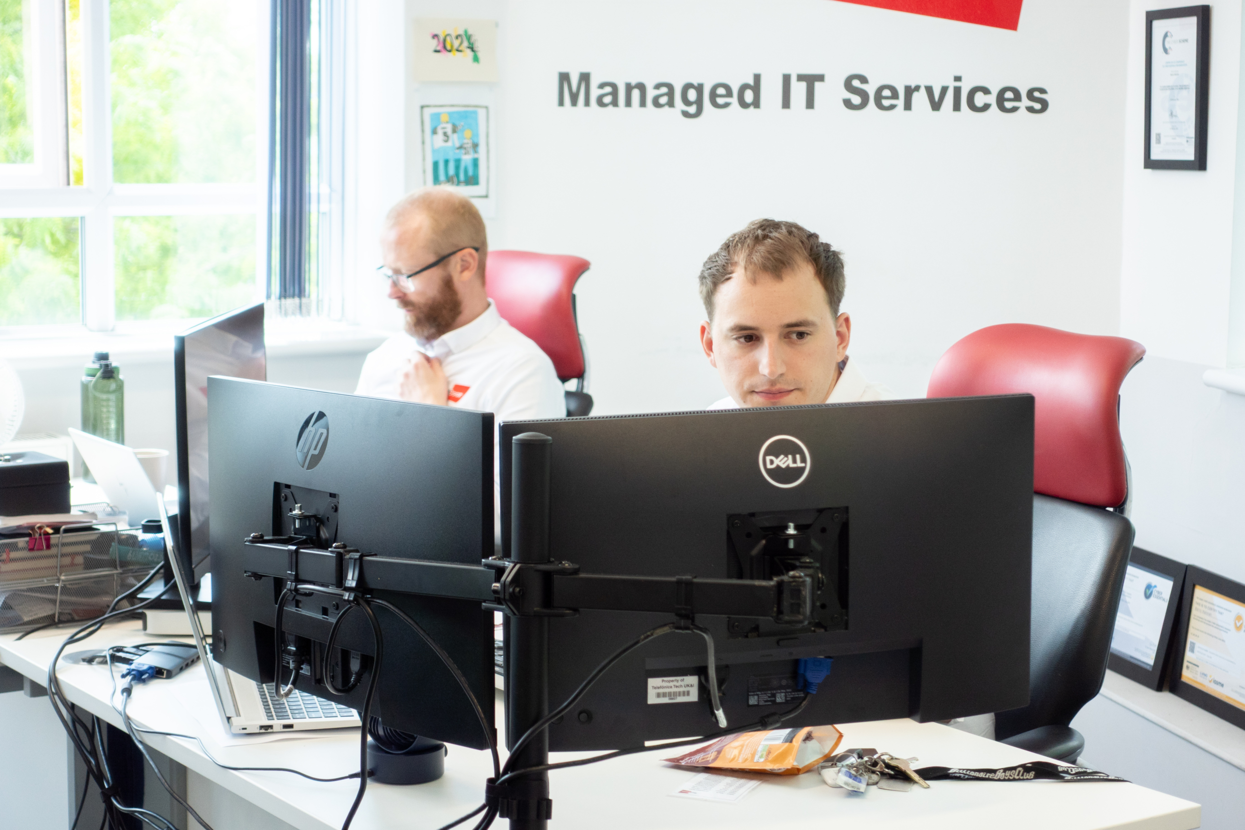 Matthew and Barry in the office working